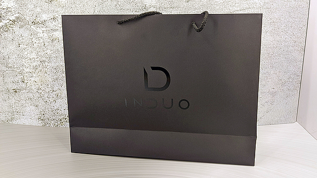 Изготовление пакетов с логотипом для компании Induo на заказ в типографии Арт Полиграфия